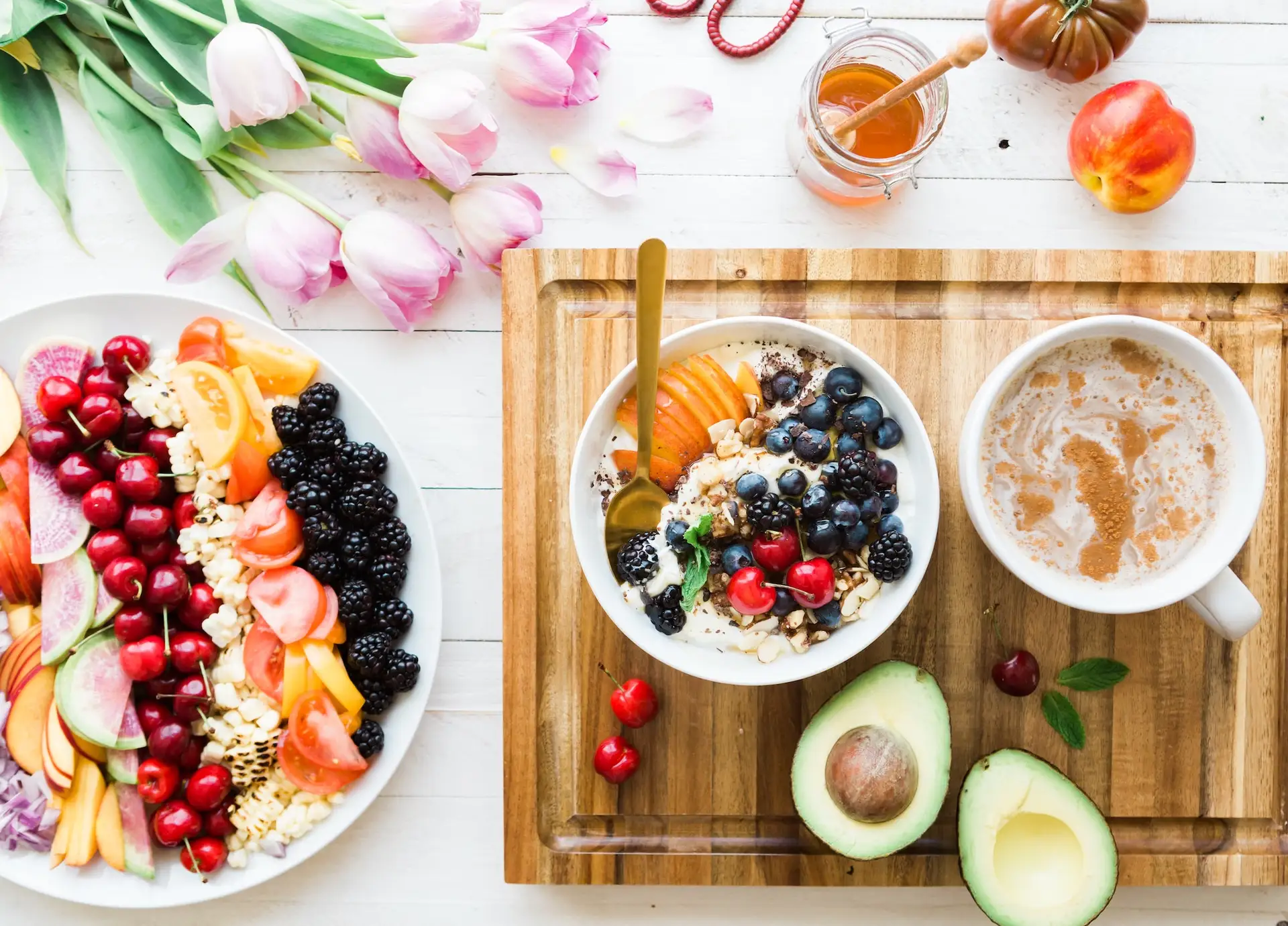 Weight Management — Healthy breakfast spread with fruit and yogurt bowl